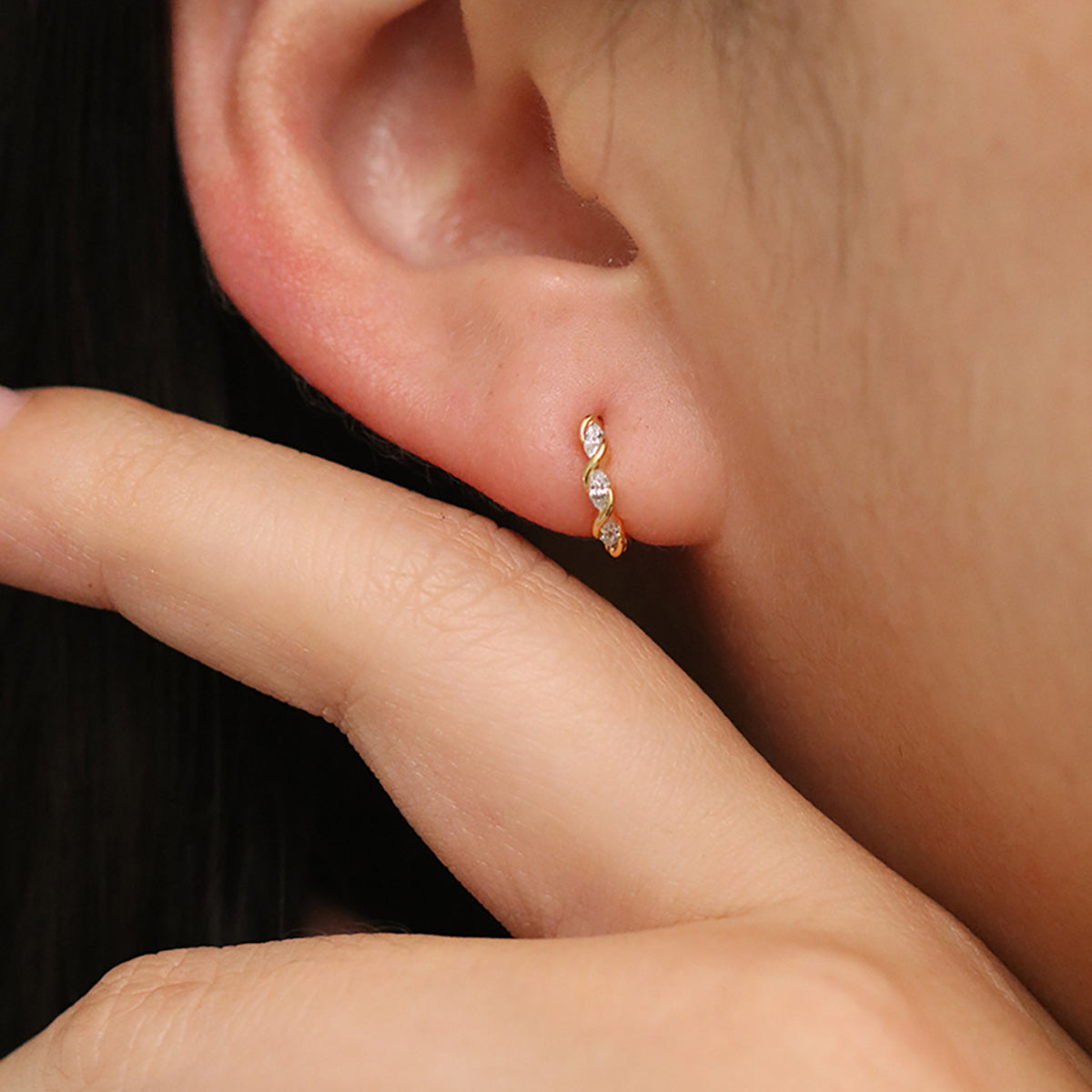 White Topaz Twirl Huggie Earrings-1